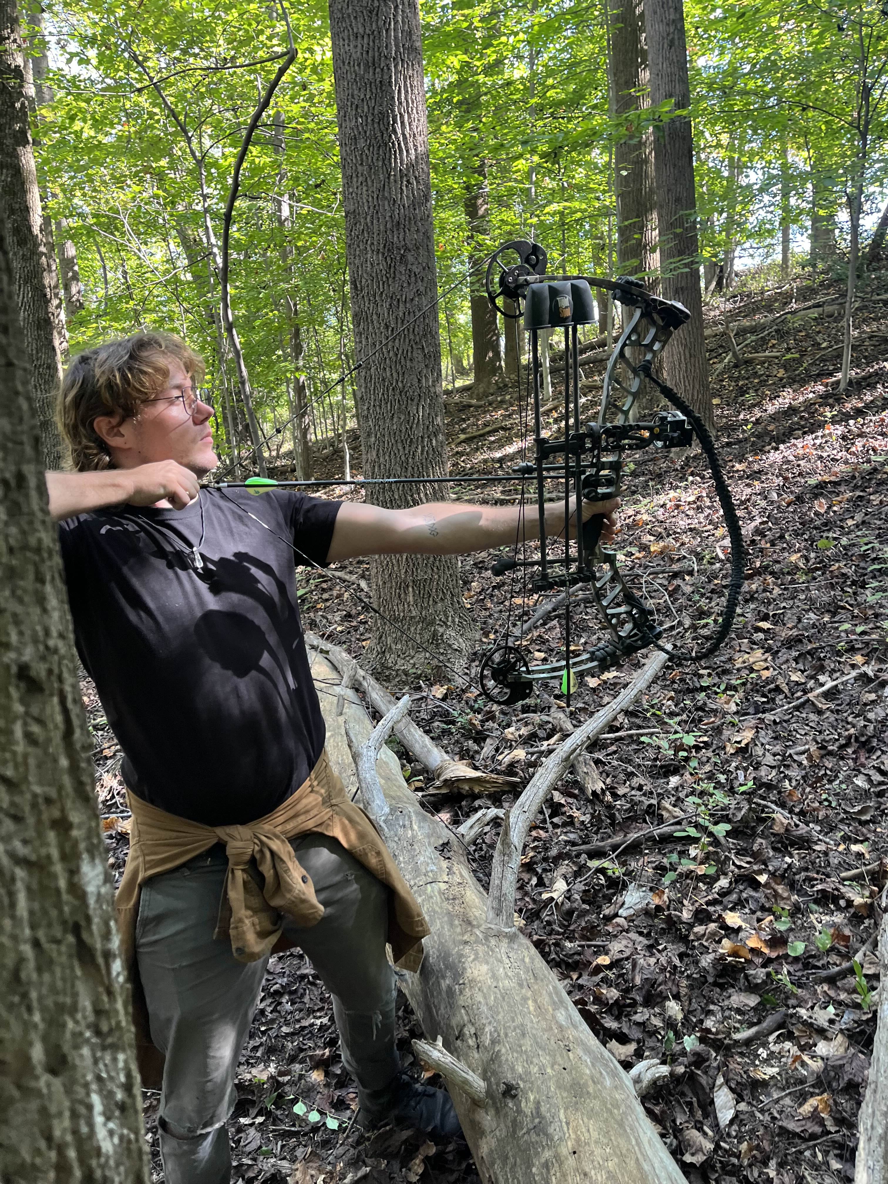 Archery practice in a wooded setting